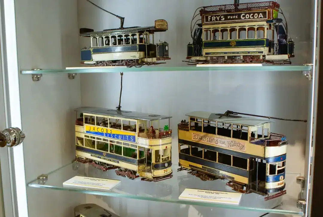 Glass display case with detailed vintage model trams, each featuring colorful signage, under a Culture Night banner with the date 19 Sept 2025 repeated along the top.